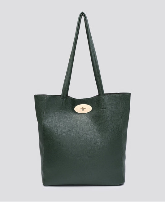 A dark green pebbled leather tote bag with dual shoulder straps and a gold-tone oval logo clasp, shown against a solid light gray background.