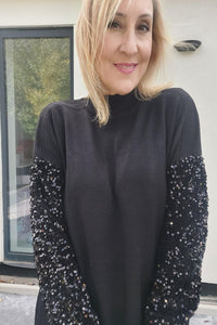 Sequin Sleeve Jumper Dress In Black - Filli London